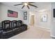 Home theater with access to hallway and other rooms at 7537 Pool Compass Loop, Wesley Chapel, FL 33545