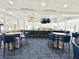 Restaurant and bar features modern fixtures, a wraparound bar, and comfortable seating at 26950 Pavin Dr, Englewood, FL 34223