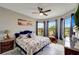 Spacious bedroom with a queen bed and beautiful water view at 1337 Sorrell Way, North Port, FL 34289