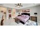 Spacious main bedroom with king-size bed and ensuite bathroom access at 1337 Sorrell Way, North Port, FL 34289