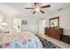 Relaxing bedroom with a comfortable bed and ensuite bathroom at 2236 Gascom St, North Port, FL 34288