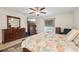 Spacious bedroom with a king-size bed and large TV at 2236 Gascom St, North Port, FL 34288