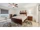 Charming bedroom with a queen bed and lots of natural light at 2236 Gascom St, North Port, FL 34288