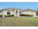 House exterior with a two-car garage and lawn at 2236 Gascom St, North Port, FL 34288