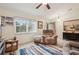 Living room with recliner chairs, TV and rug at 2236 Gascom St, North Port, FL 34288