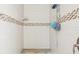 Clean shower with tiled walls and built-in seat at 2236 Gascom St, North Port, FL 34288