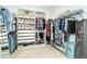 Organized walk-in closet with custom shelving and plenty of storage space at 13092 Rinella St, Venice, FL 34293