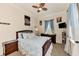 Bedroom with double bed, nightstands, and window at 13104 Creekside Ln, Port Charlotte, FL 33953