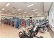 Modern gym with various exercise equipment and large windows at 13104 Creekside Ln, Port Charlotte, FL 33953