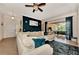 Bright living room with sectional sofa, and view to the backyard at 13104 Creekside Ln, Port Charlotte, FL 33953