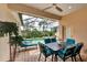 Outdoor patio area with pool, spa, and seating at 13104 Creekside Ln, Port Charlotte, FL 33953