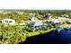 Wide aerial view of property, showing canal front location at 15764 Autry Cir, Port Charlotte, FL 33981