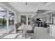 Bright dining area with sliding doors leading to the pool and patio at 15764 Autry Cir, Port Charlotte, FL 33981