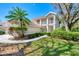 Two-story condo with attached garage and landscaped grounds at 3113 Club Dr # 118, Port Charlotte, FL 33953