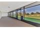 Long screened porch overlooking backyard at 7381 Thomas St, Englewood, FL 34224