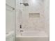 Modern bathroom with marble shower and soaking tub at 384 Baytree Dr, Rotonda West, FL 33947