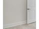 White interior door with brushed nickel hardware and baseboards at 384 Baytree Dr, Rotonda West, FL 33947