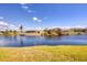 Scenic waterfront property with canal access and lush landscaping at 9428 Nastrand Cir, Port Charlotte, FL 33981