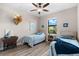 Guest bedroom with twin beds, ceiling fan and plenty of natural light at 15576 Aldama Cir, Port Charlotte, FL 33981