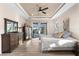 Spacious bedroom with king-size bed and access to a patio at 15576 Aldama Cir, Port Charlotte, FL 33981