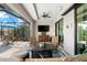 Relaxing lanai with seating area, TV, and access to pool at 15576 Aldama Cir, Port Charlotte, FL 33981