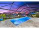 Enclosed pool and spa with sunset view at 15576 Aldama Cir, Port Charlotte, FL 33981