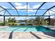 Relaxing pool and spa area with canal views at 15576 Aldama Cir, Port Charlotte, FL 33981