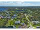 Wide aerial view of home and surrounding neighborhood at 5105 Ackley Ter, Port Charlotte, FL 33981