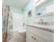 Updated bathroom with granite vanity, shower, and updated fixtures at 6800 Placida Rd # 268, Englewood, FL 34224