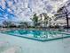 Refreshing community pool with surrounding lounge chairs at 6800 Placida Rd # 268, Englewood, FL 34224