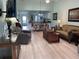 Bright living room features light flooring and comfortable furnishings at 6800 Placida Rd # 268, Englewood, FL 34224