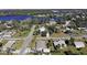 Aerial view showing home's location in a residential neighborhood at 700 Coquina Ct, Nokomis, FL 34275