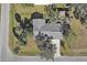 Aerial view of the house and surrounding area at 700 Coquina Ct, Nokomis, FL 34275