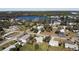 Aerial view of the home and surrounding neighborhood at 700 Coquina Ct, Nokomis, FL 34275