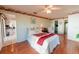 Bedroom with a view of the kitchen and access to a bathroom at 700 Coquina Ct, Nokomis, FL 34275