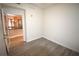 Small bedroom with kitchen view and wood-look floors at 1120 E Kennedy Blvd # 1423, Tampa, FL 33602