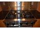 Stainless steel gas cooktop with five burners at 1120 E Kennedy Blvd # 1423, Tampa, FL 33602