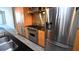 Stainless steel appliances and granite countertops in modern kitchen at 1120 E Kennedy Blvd # 1423, Tampa, FL 33602