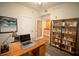 Home office with a large desk and bookshelves at 1120 E Kennedy Blvd # 1423, Tampa, FL 33602