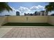 Designated pet area with artificial turf and signage at 1120 E Kennedy Blvd # 1423, Tampa, FL 33602