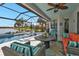 Relaxing screened pool and patio area overlooking lake at 13215 Amerigo Ln, Venice, FL 34293