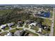 Aerial view of a residential neighborhood near the water at 2213 Oleada Ct, Englewood, FL 34224