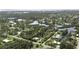 Wide aerial view of waterfront community with lush landscape at 446 Court St, Englewood, FL 34223