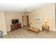 Cozy living room features ceiling fan and neutral colors at 6113 Partridge Ave, Englewood, FL 34224