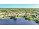 Lakefront property, single-story home with pool at 3238 Osprey Ln, Port Charlotte, FL 33953
