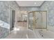 Main bathroom features a walk-in shower, bathtub, and double sink vanity at 3238 Osprey Ln, Port Charlotte, FL 33953
