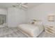 Spacious bedroom with a king-size bed and ensuite bathroom access at 3238 Osprey Ln, Port Charlotte, FL 33953