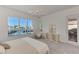 Main bedroom with water view, sliding door to patio, and ample natural light at 3238 Osprey Ln, Port Charlotte, FL 33953