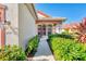 Welcoming walkway leading to the front door of the home at 3238 Osprey Ln, Port Charlotte, FL 33953