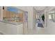 Kitchen with light cabinets and gray countertops at 3238 Osprey Ln, Port Charlotte, FL 33953